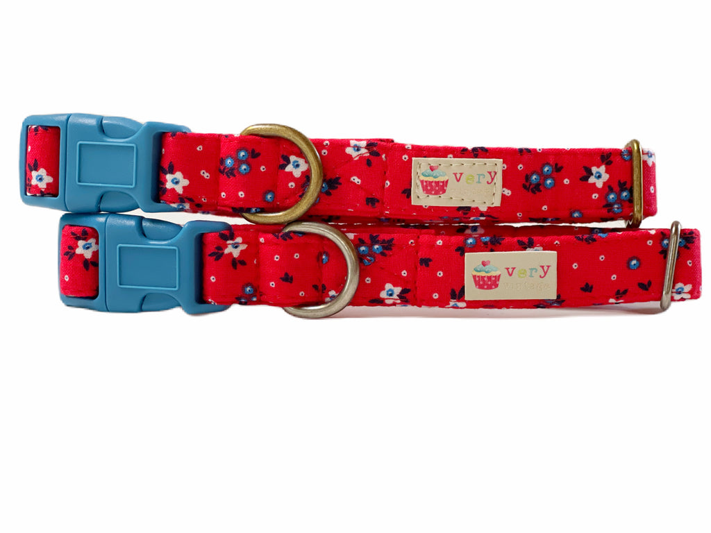 handmade organic cotton dog and cat collars with a bright red cotton fabric with white and blue patriotic flowers 
