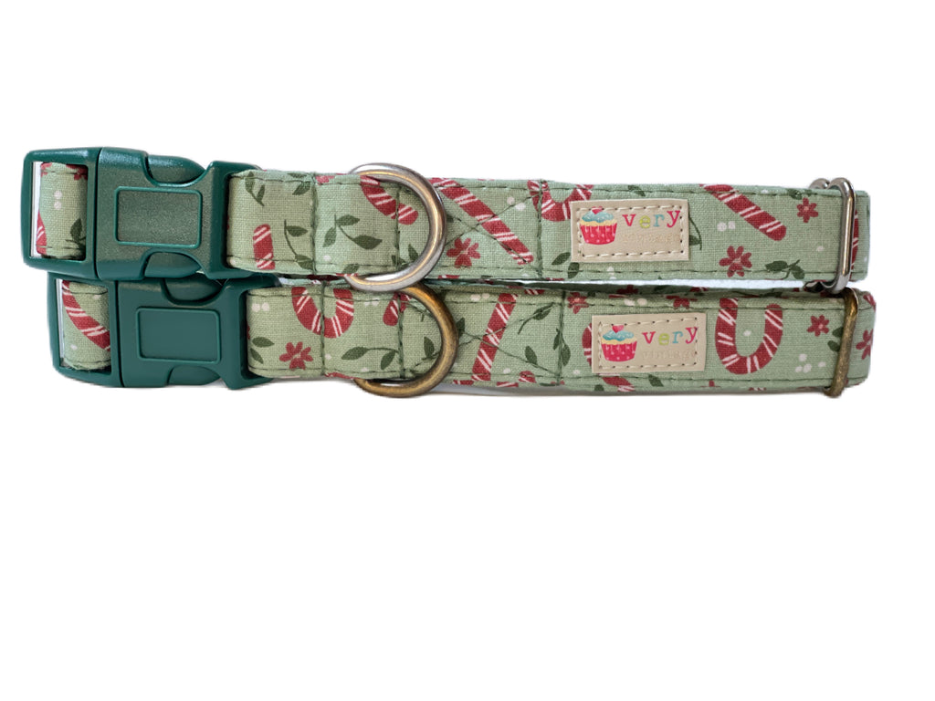 light green with red and white candy canes and leaves with small poinsettia flowers organic cotton dog and cat collars