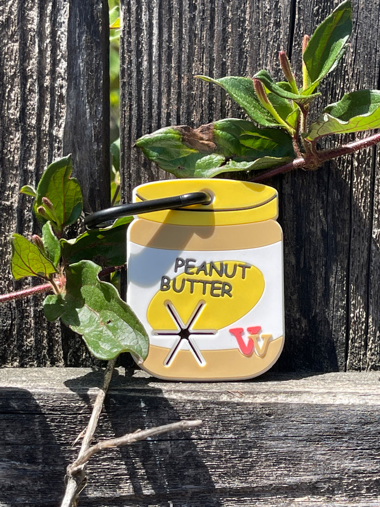 peanut butter jar used poop bag holder for a dog leash