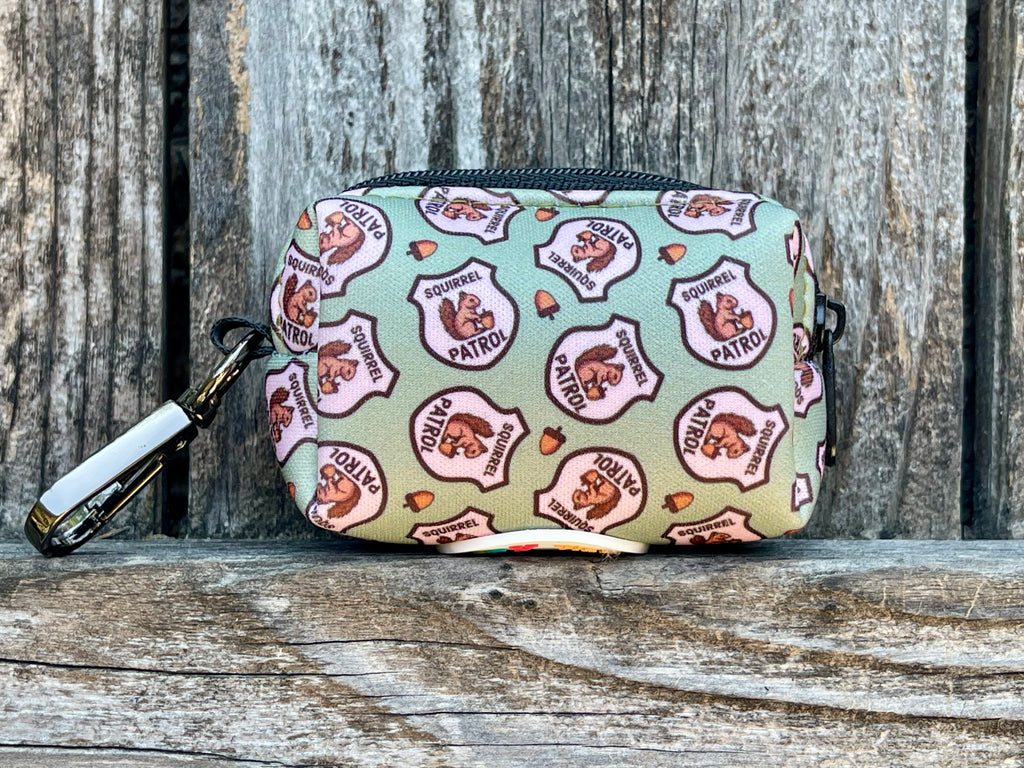 light green with tiny brown acorns and a fun "squirrel patrol" badge pattern dog waste bag holder