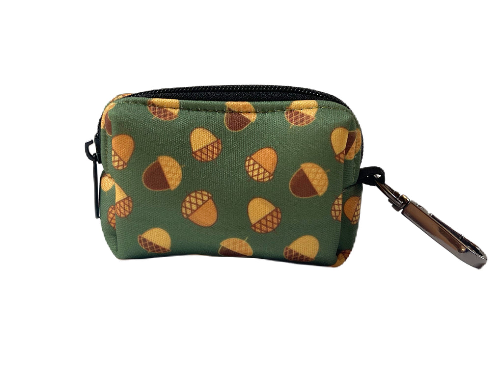 Eco-friendly hunter green neoprene dog waste bag dispenser featuring a brown acorn pattern. Easily attaches to leash for convenient cleanup.