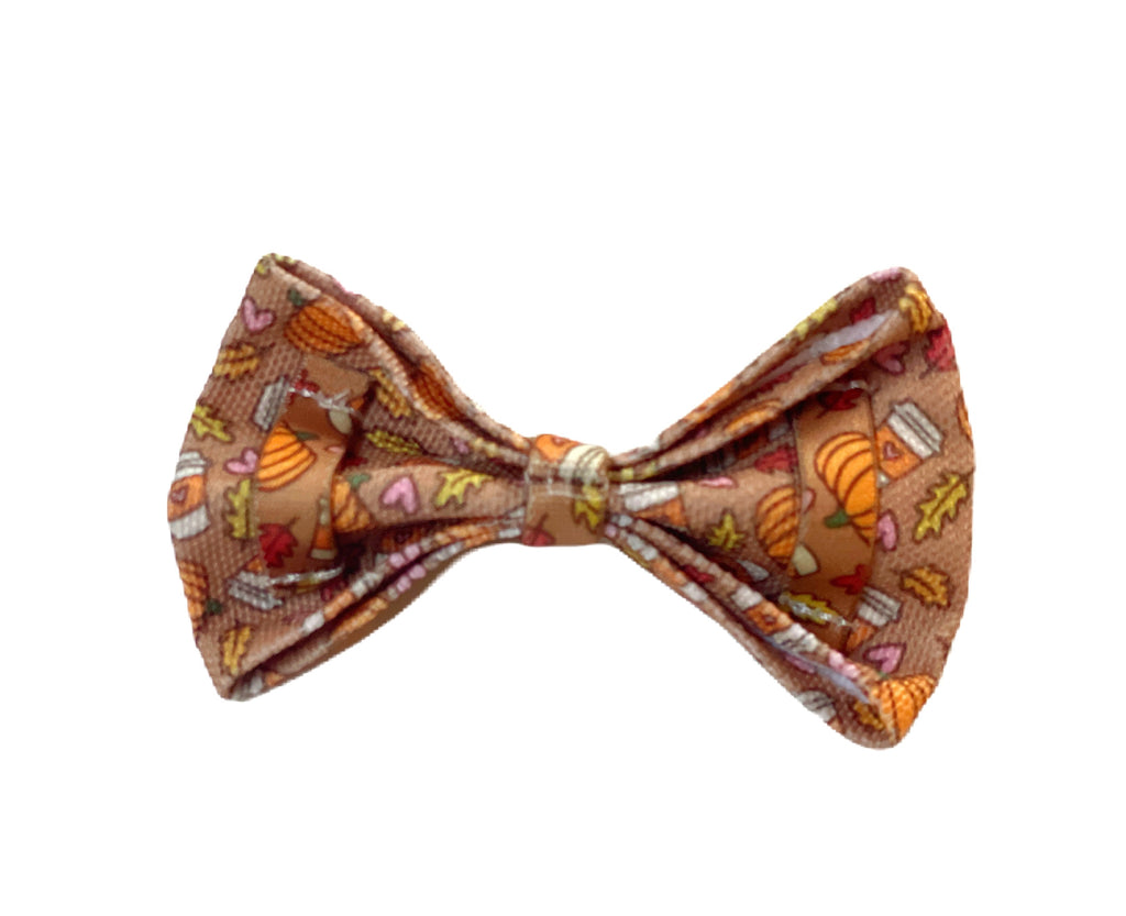 back of autumn patterned pumpkin spice dog bow with elastic attachment for secure playtime.