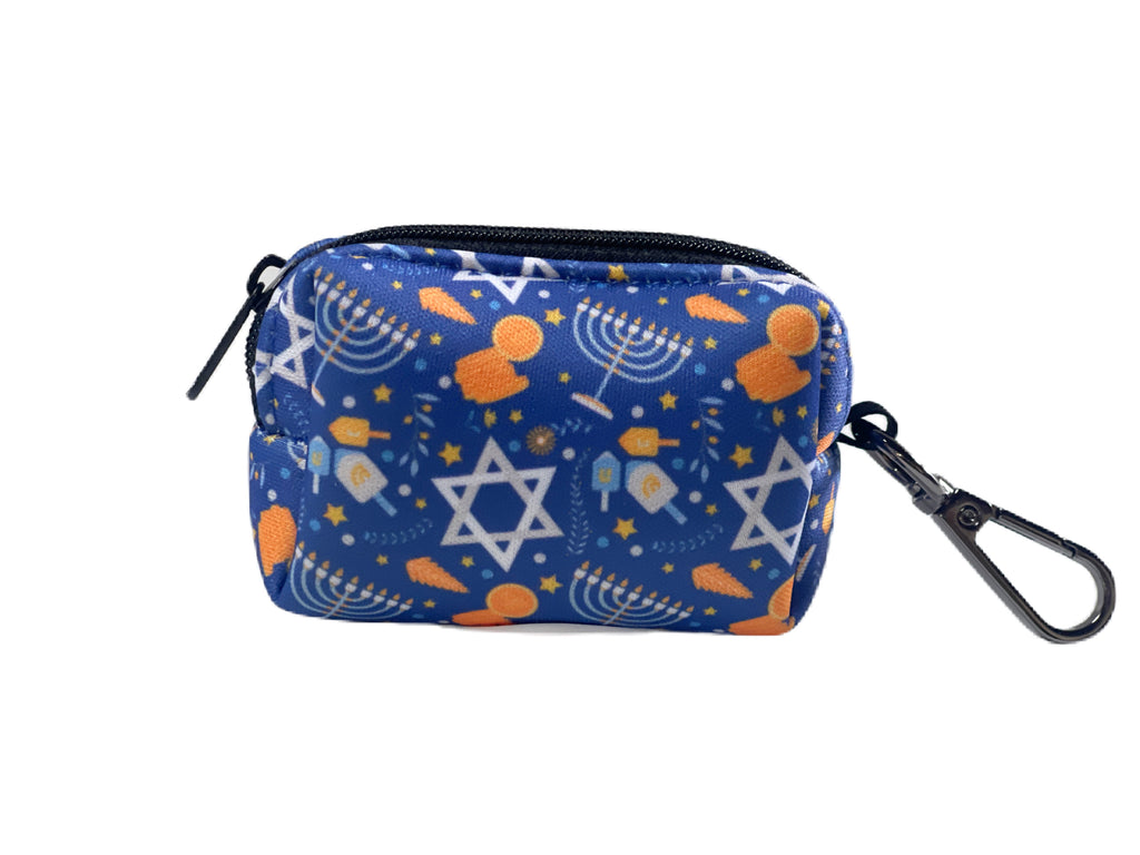 A close-up of the detailed Hanukkah design on the dog waste bag holder.