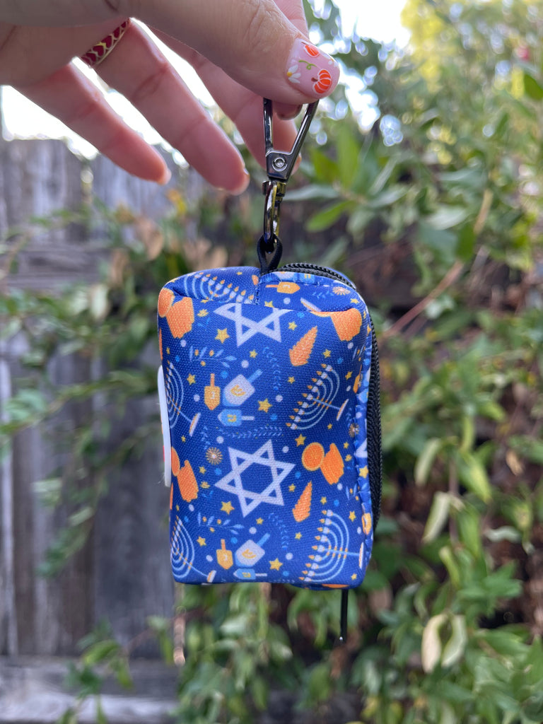 A stylish and functional dog waste bag holder perfect for your Hanukkah walks.