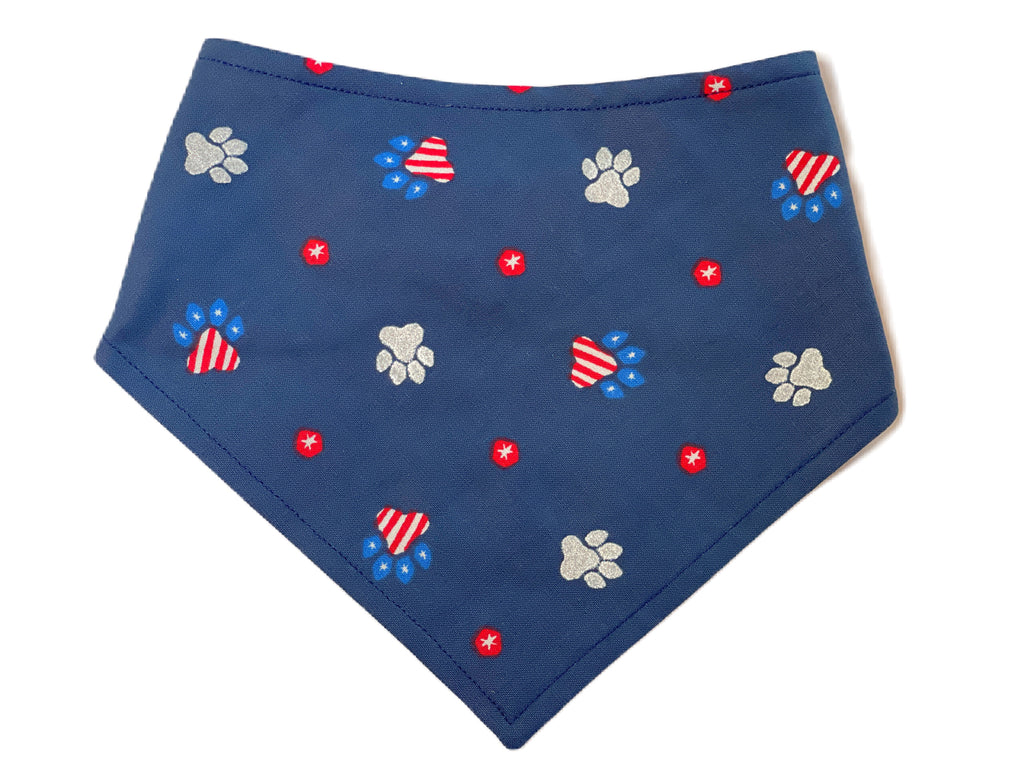 navy blue with red stars, silver paws, and American flag paw prints handmade in the usa dog bandana