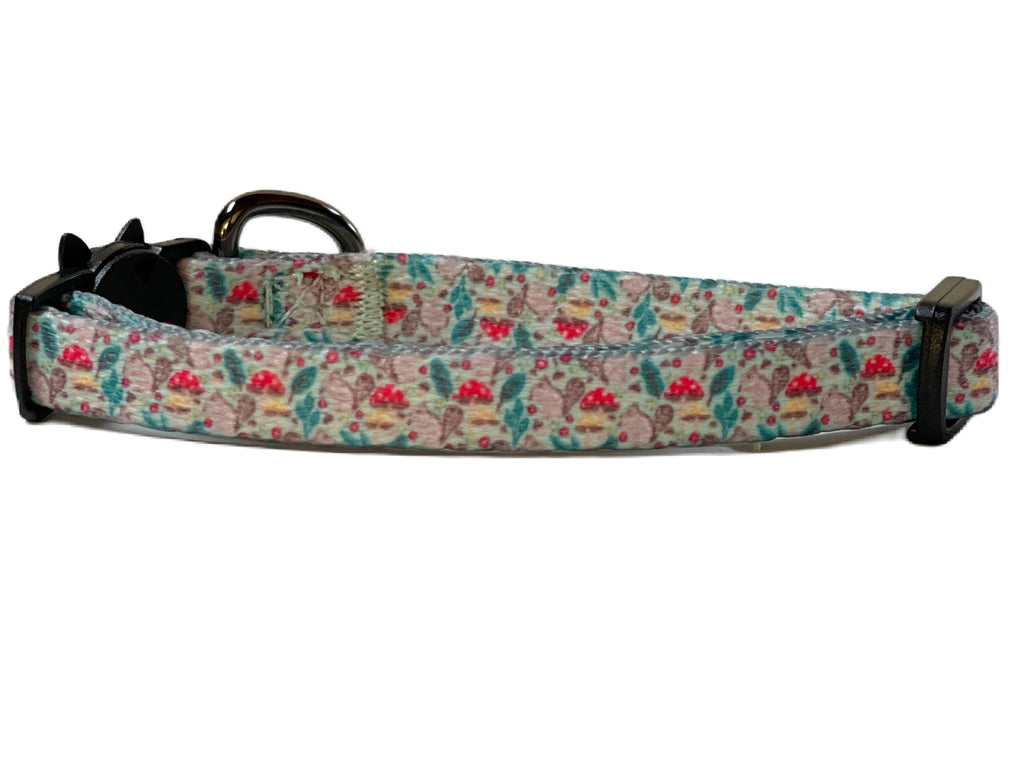 mint green breakaway cat collar with gray squirrels and toadstools pattern