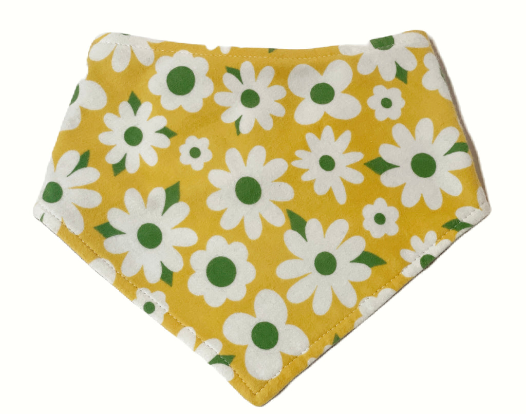 A bright sunshine yellow with big white daisy flowers handmade organic cotton dog bandana. Handmade in Los Angeles.