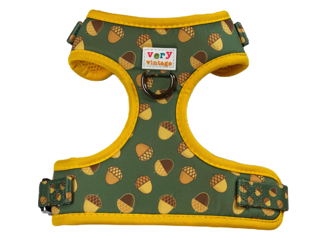 hunter green with brown acorns and yellow trim adjustable designer dog harness vest. Eco-friendly dog harness with acorn print on olive green background