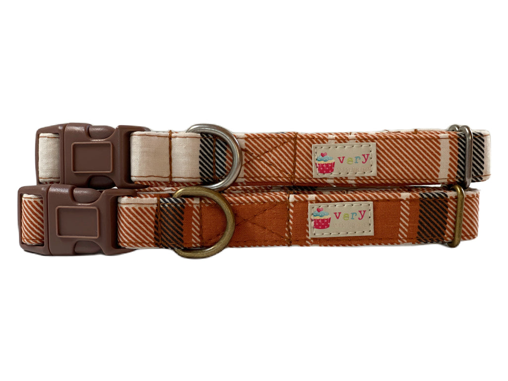 handmade organic cotton dog and cat collars in a brown, cream, black and burnt orange plaid cotton fabric. Handmade in the USA. Eco-friendly and cat collar has a breakaway buckle for safety.