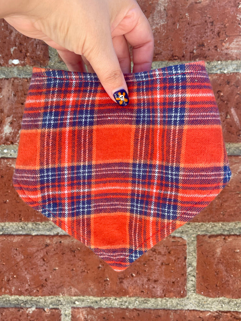 Orange plaid fall dog bandana with navy accents, handmade eco-friendly snap-on pet scarf