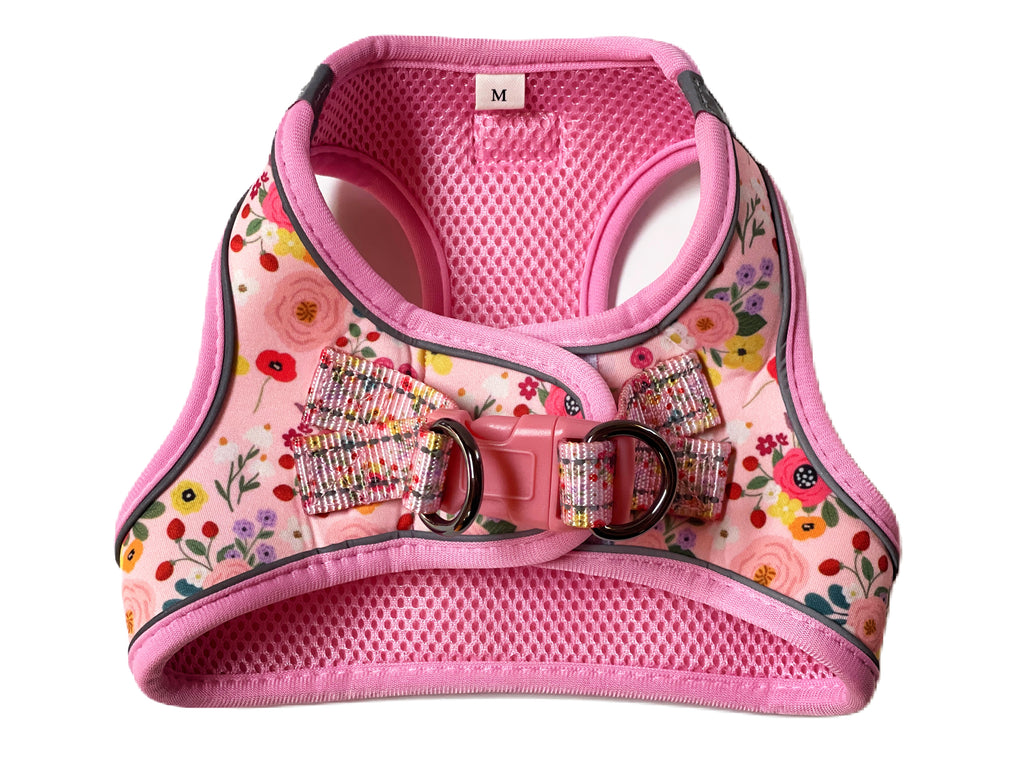 Back of pink floral harness with secure velcro and buckle fastening