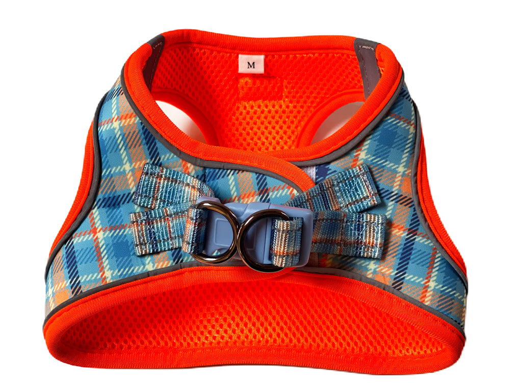 back of blue and orange plaid dog harness vest with light blue buckle closure and velcro for added security and comfortable fit