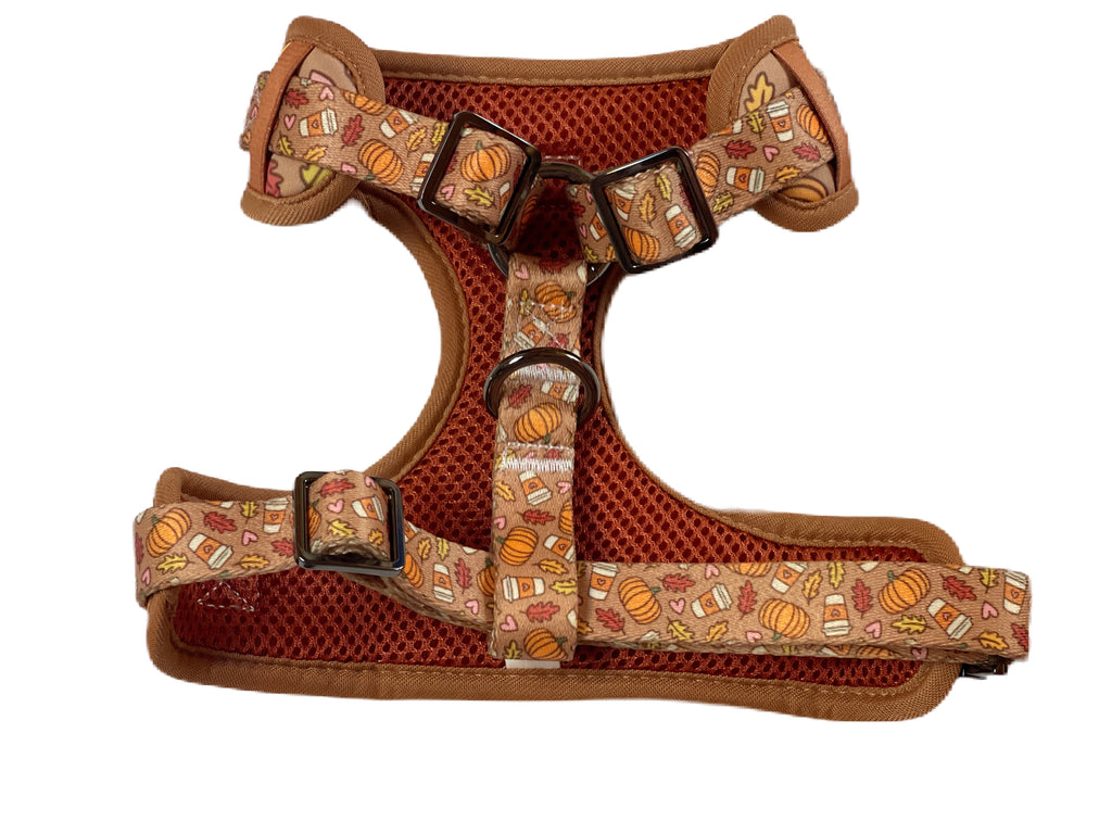 light brown with a pumpkin spice pattern adjustable puppy harness with metal hardware and buckle