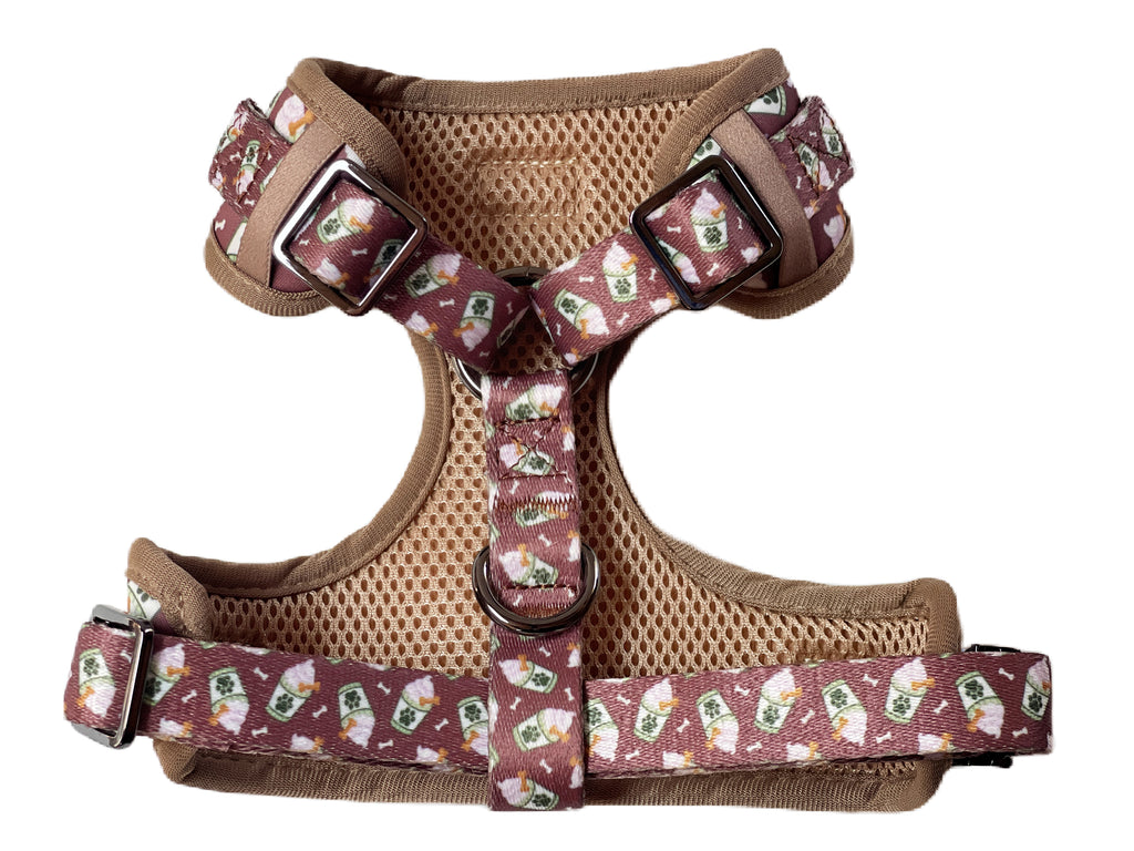 High-quality dog harness with a soft, comfortable bodice and adjustable straps. Durable dark metal hardware and a unique coffee latte pattern make this harness both stylish and functional.