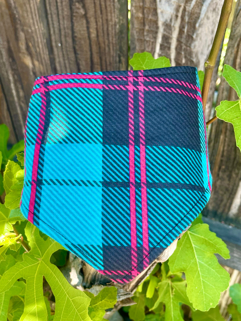 The Bowie bandana laid flat showing punk-inspired plaid pattern with bright colors on soft cotton background