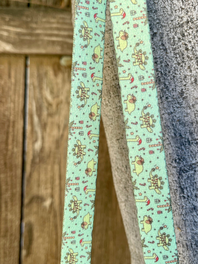 Handmade eco-friendly dog leash with a festive dinosaur christmas print
