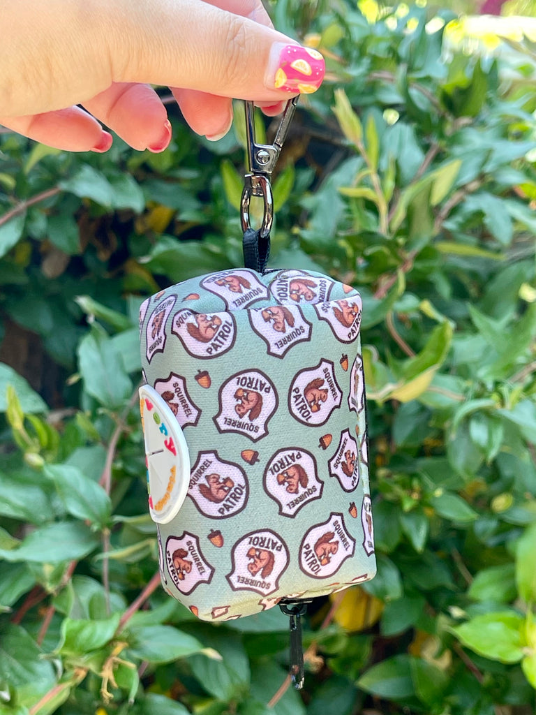 Show your love for squirrels with our adorable Squirrel Patrol Poop Bag Holder. This stylish and functional accessory is perfect for keeping your walks clean and organized.