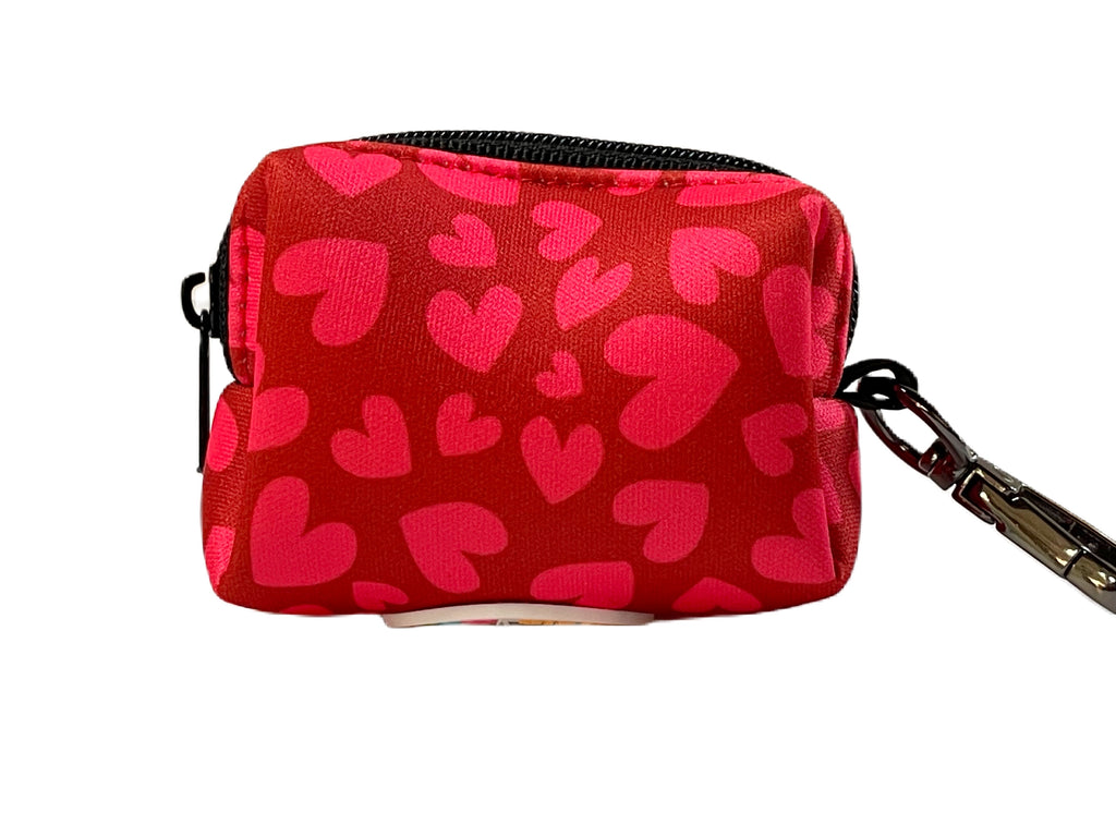 red with lighter red hearts pattern poop bag with zipper and clip to easily attach to any leash for hands free clean up