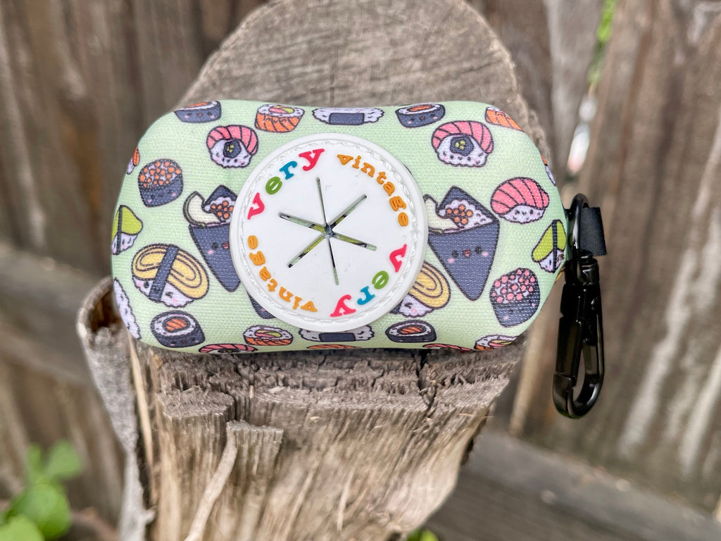 Back of sushi poop bag holder with rubber dispenser and logo
