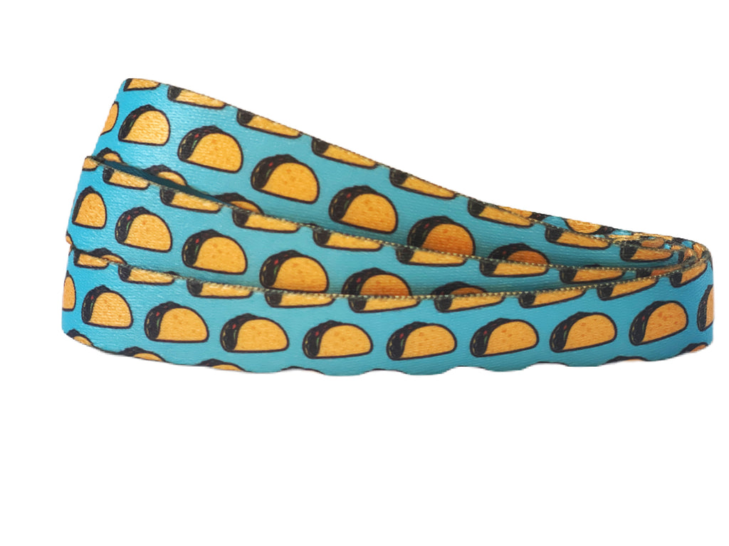 bright blue taco print 5ft length dog lead with secure metal hardware and padded handle.