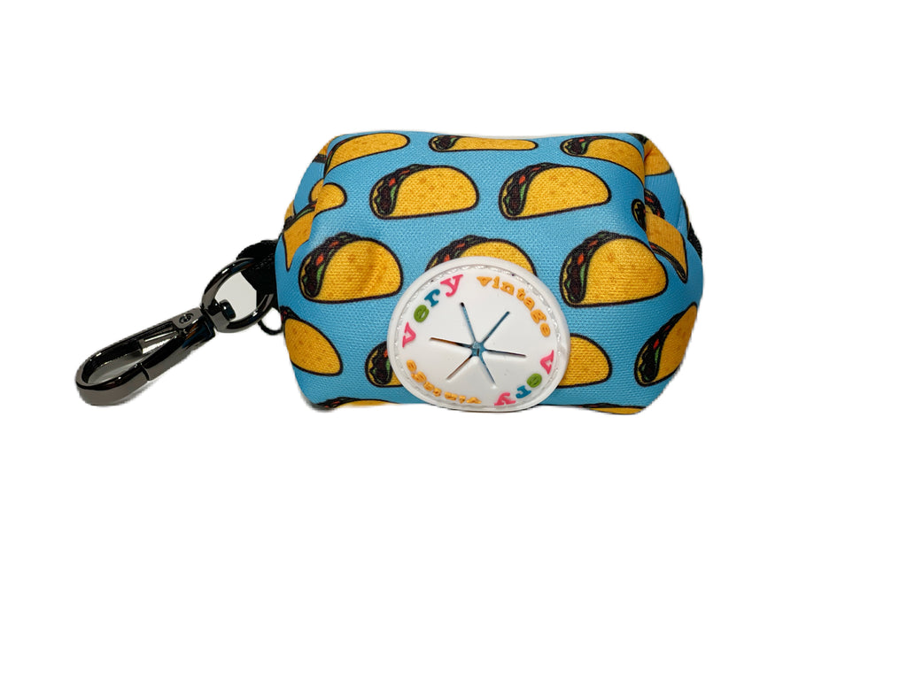 Hands-free dog waste bag dispenser with a secure closure and fun taco pattern.