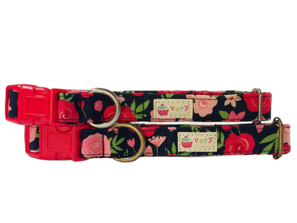 black cotton with red and pink flowers dog collar with a matching red buckle