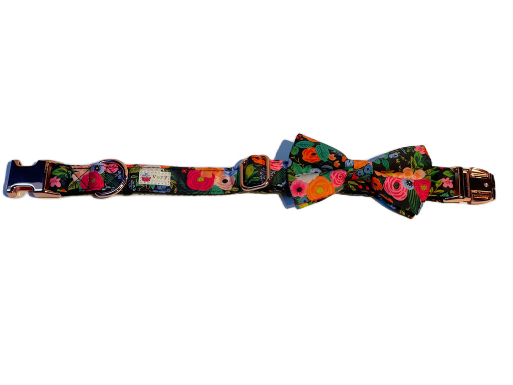 girl dog collar with black floral pattern and bow attached