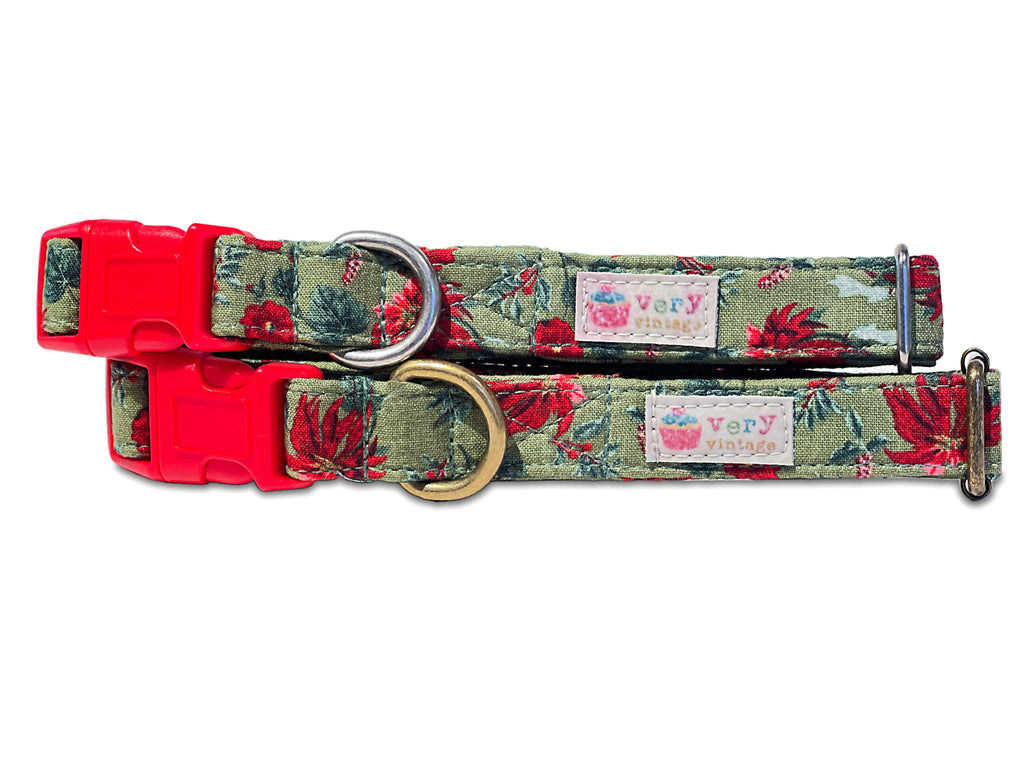 Handmade organic cotton dog collar with red amaryllis and poinsettia flowers on a green background. Perfect for the holidays. Available in various sizes for dogs and cats, with antique brass or silver hardware. Breakaway buckle option for cats