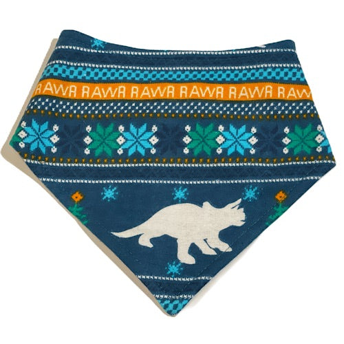 Blue Fair Isle pet bandana featuring a festive Christmas pattern with playful dinosaurs.