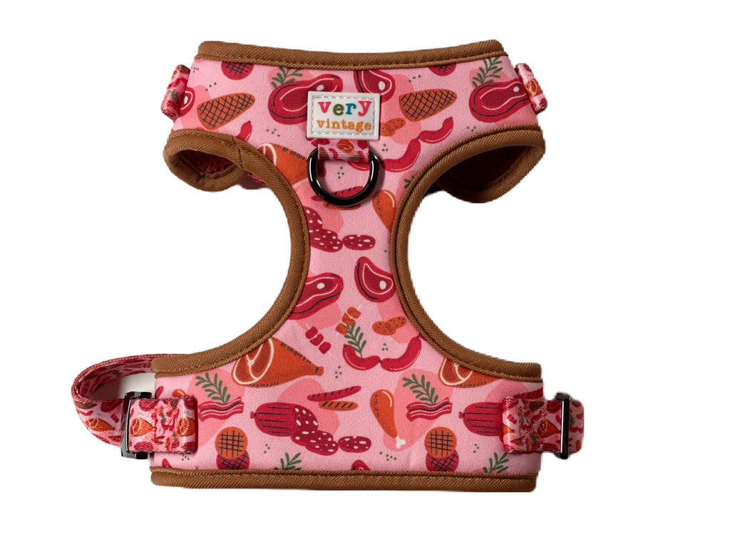 adjustable dog harness with a red and pink sausage, steak, ham and other meats pattern