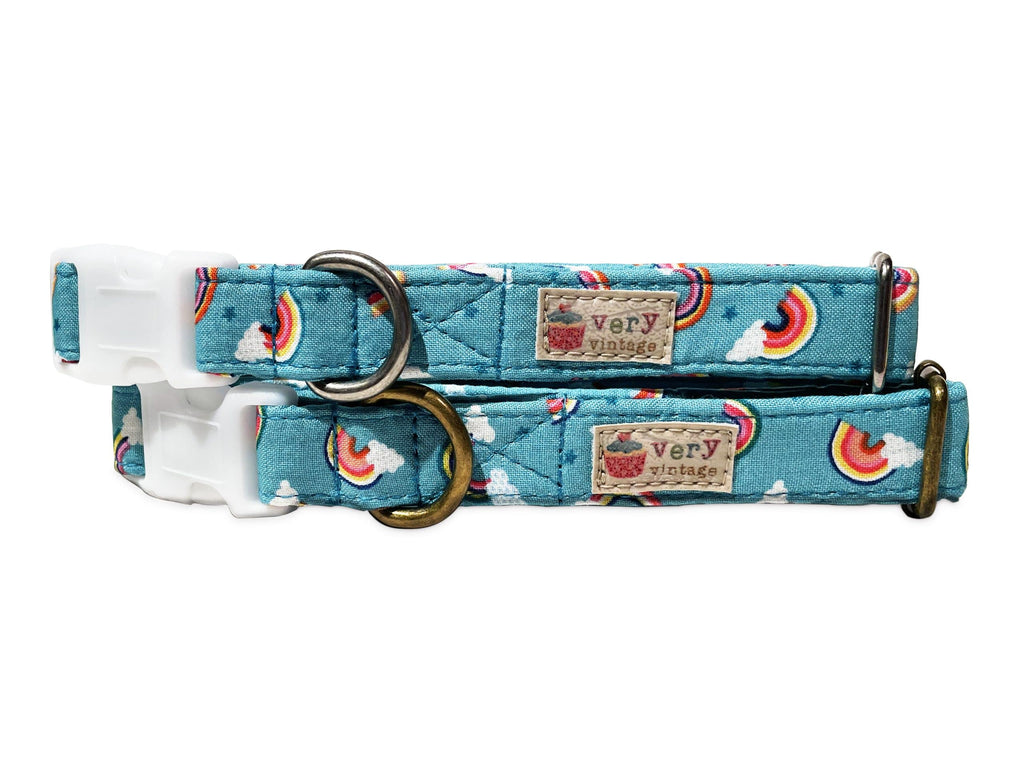 A close-up of the light blue or teal collar featuring a colorful rainbow pattern, capturing the vibrant, joyful design. Available with antique brass or antique silver hardware, this collar is perfect for spring, summer, or Pride.