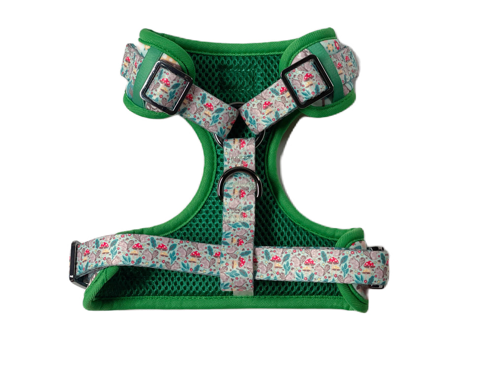 Adjustable heavy-duty small dog harness with sturdy metal hardware and two D-rings for secure leash attachment.