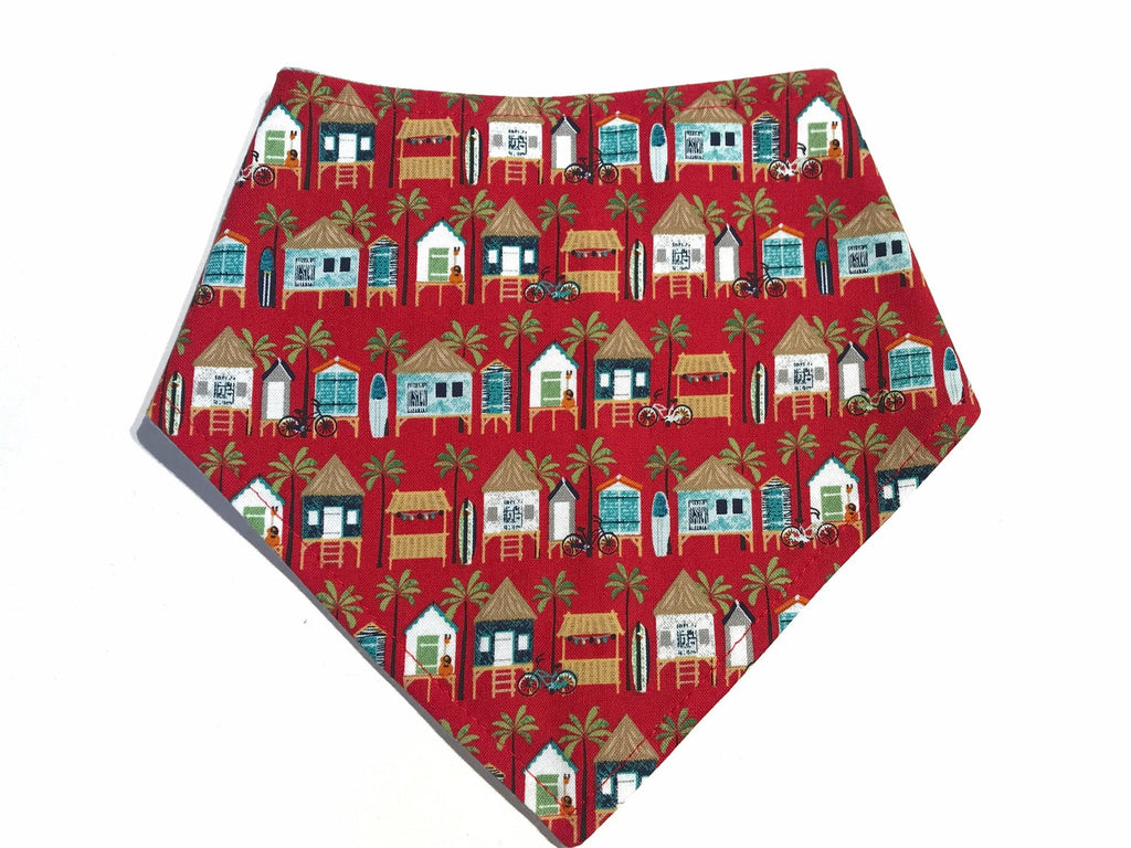 Snap-on bandana for dogs, featuring a charming red beach hut design.