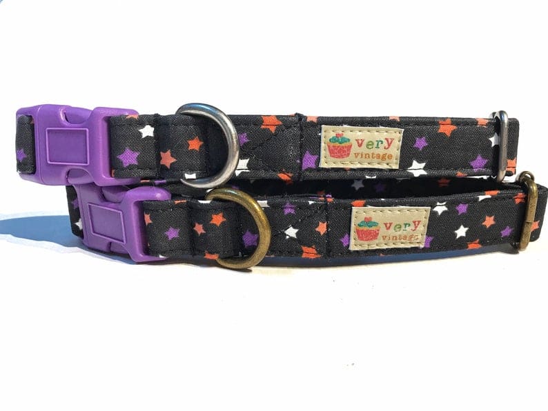 A close-up of the black collar with purple, orange, and white stars, showcasing the spooky and witchy design. Available with antique brass or antique silver hardware, this collar adds a fun, Halloween-ready touch to your pet’s look. Spooky cute!