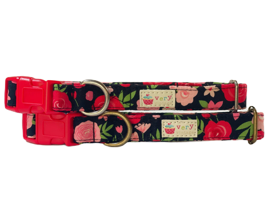 A close-up of the black collar with pink and red roses, showcasing the girly, floral design. Available with antique brass or antique silver hardware, this collar adds a romantic and feminine touch to your pet’s look. Perfect for Valentine's Day.