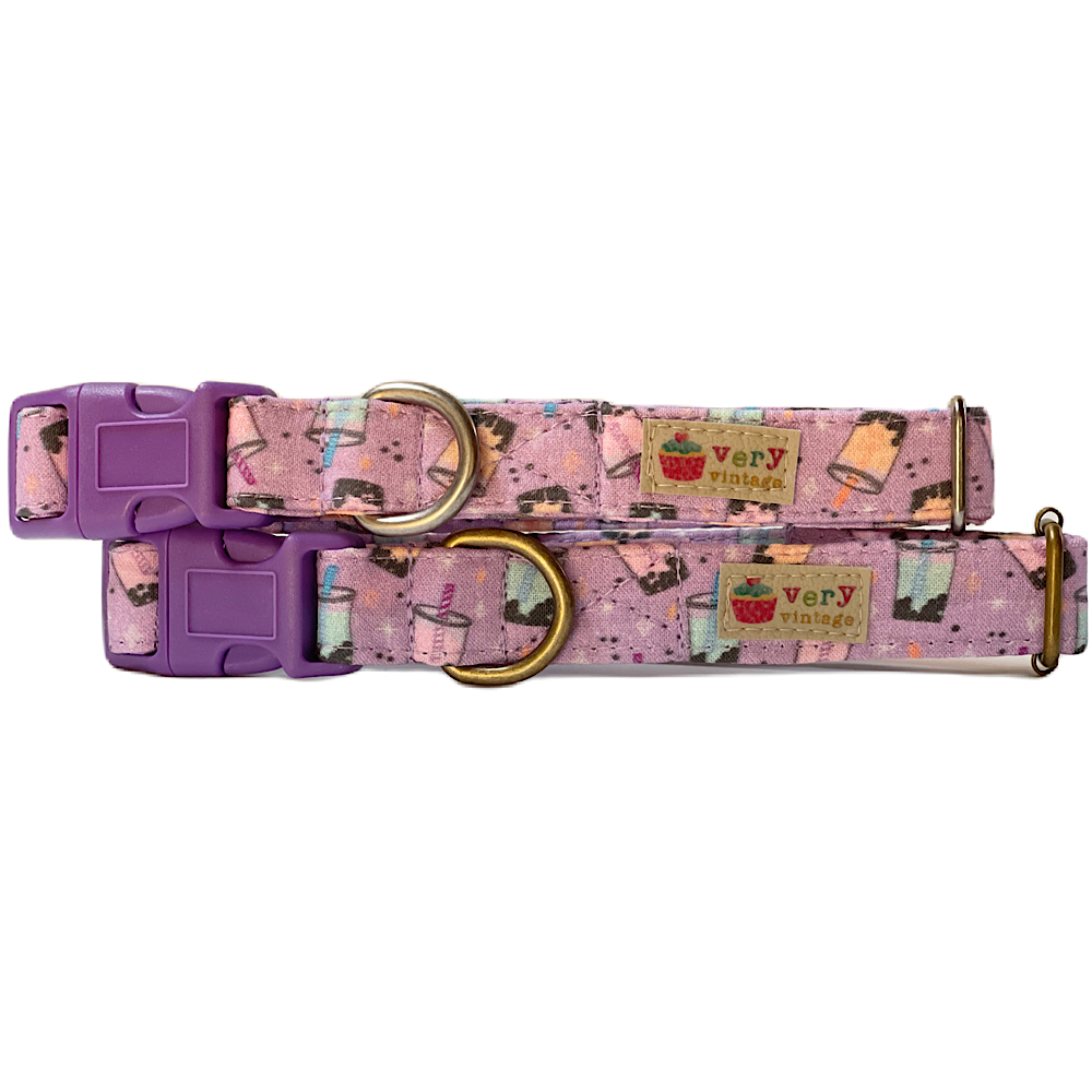 Handmade organic cotton dog collar with a playful light purple background featuring colorful boba milk tea cups. Available in custom sizes for dogs and cats, with antique brass or silver hardware. Breakaway buckle option for cats for added safety.