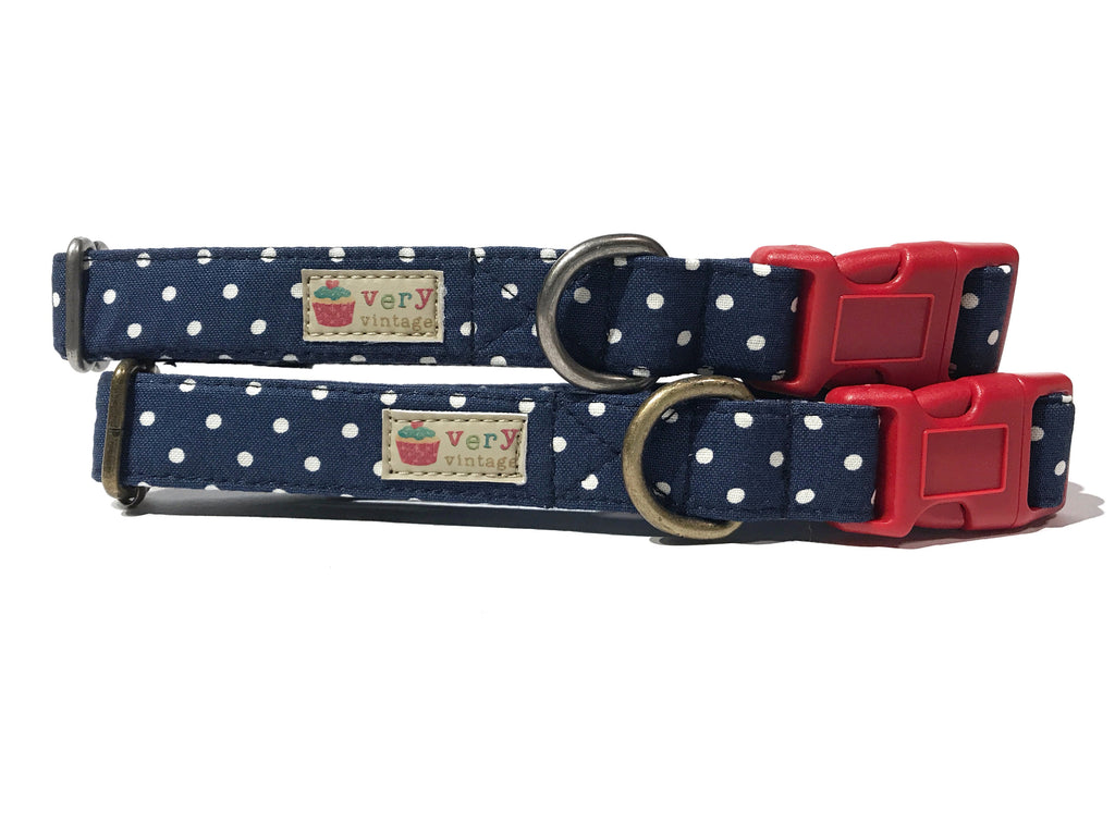 Handmade organic cotton dog collar featuring classic navy blue and white polka dots, with a nautical theme. Available in custom sizes for dogs and cats, with antique brass or silver hardware. Breakaway buckle option for added cat safety.