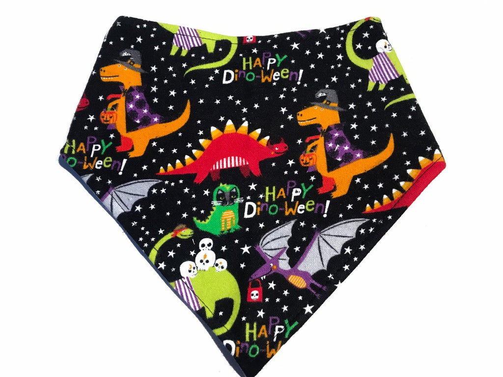 Handmade in Los Angeles, black with colorful halloween dinosaurs snap-on bandana for dogs and cats. Made from soft flannel with an eco-friendly organic cotton backing and 3 snaps for an adjustable fit.