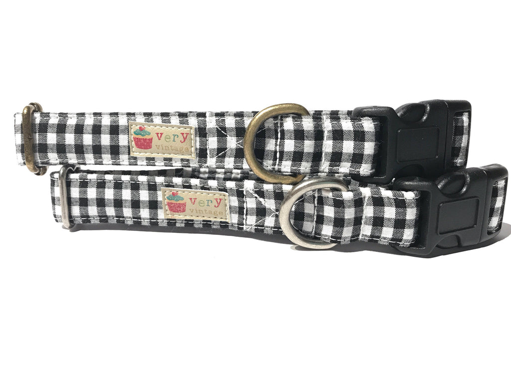 Handmade organic cotton dog and cat collar featuring a classic black and white gingham plaid pattern. Timeless and versatile, this collar adds a stylish touch to your pet’s wardrobe with its clean, checkered design."