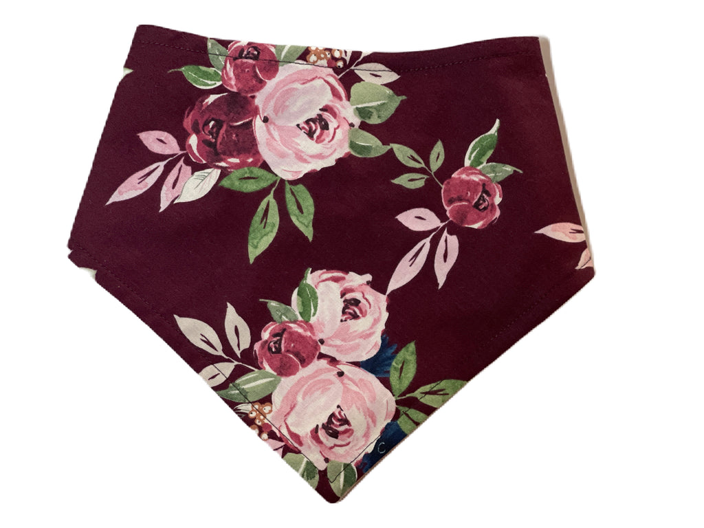 Handmade maroon bandana with light pink and red cabbage roses and green leaves, for dogs and cats.