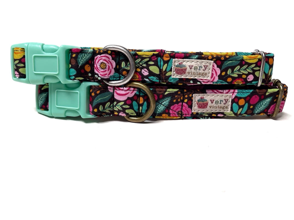 Close-up of a brown collar featuring vibrant pink and yellow flowers with a bohemian and feminine vibe. The collar is made from soft organic cotton and is finished with antique brass or antique silver hardware, perfect for adding a touch of style to your dog or cat's wardrobe.