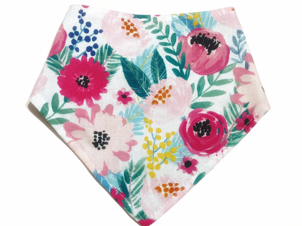 Handmade eco-friendly Kew Gardens floral snap-on bandana for dogs, featuring a vibrant floral pattern and adjustable snap closures for a comfortable, customizable fit.