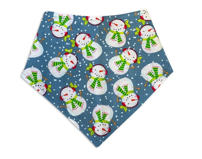 Light blue gray dog bandana with white snow and a whimsical snowman pattern. Handmade in California. 