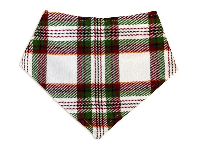 Handmade in Los Angeles. White with green and red christmas tartan plaid dog bandana. 3 snaps on the back for a secure and adjustable fit.