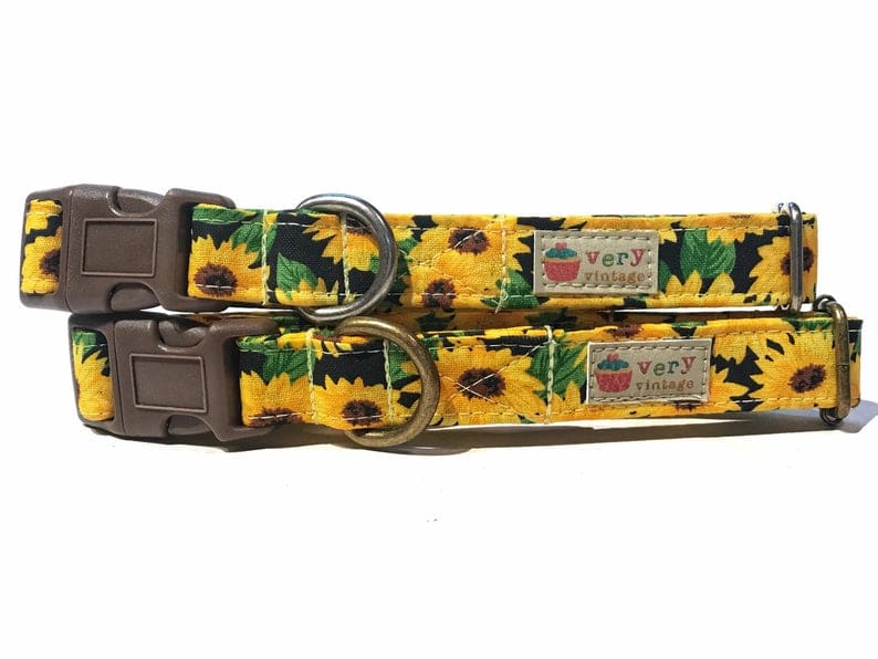 A close-up of the black collar with bright yellow sunflowers, showcasing the bold and cheerful design. Available with antique brass or antique silver hardware, this collar adds a sunny, floral touch to your pet’s wardrobe. Handmade in Los Angeles. Cat collars with breakaway buckles.