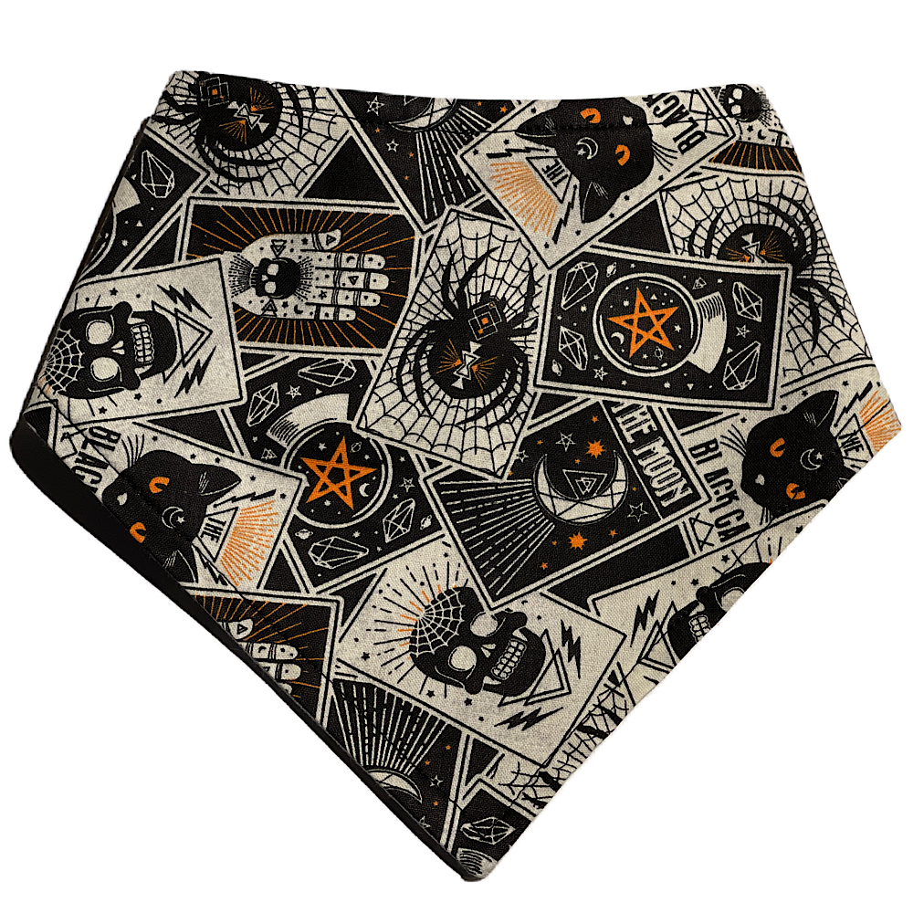black and cream tarot cards with a touch of orange bandana for dogs and cats. Handmade in California.