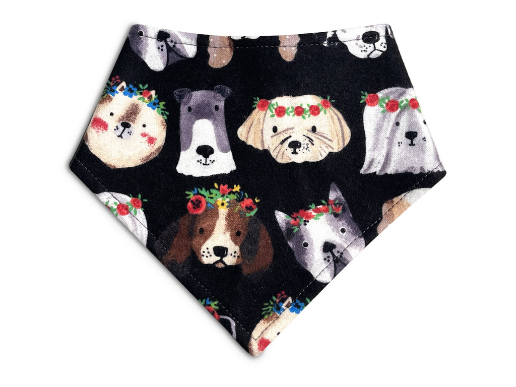 An adorable dog bandana featuring a black cotton flannel with a variety of dog breeds with cute flower crowns. Handmade in Los Angeles and featuring 3 snaps on the back for an adjustable and secure fit.